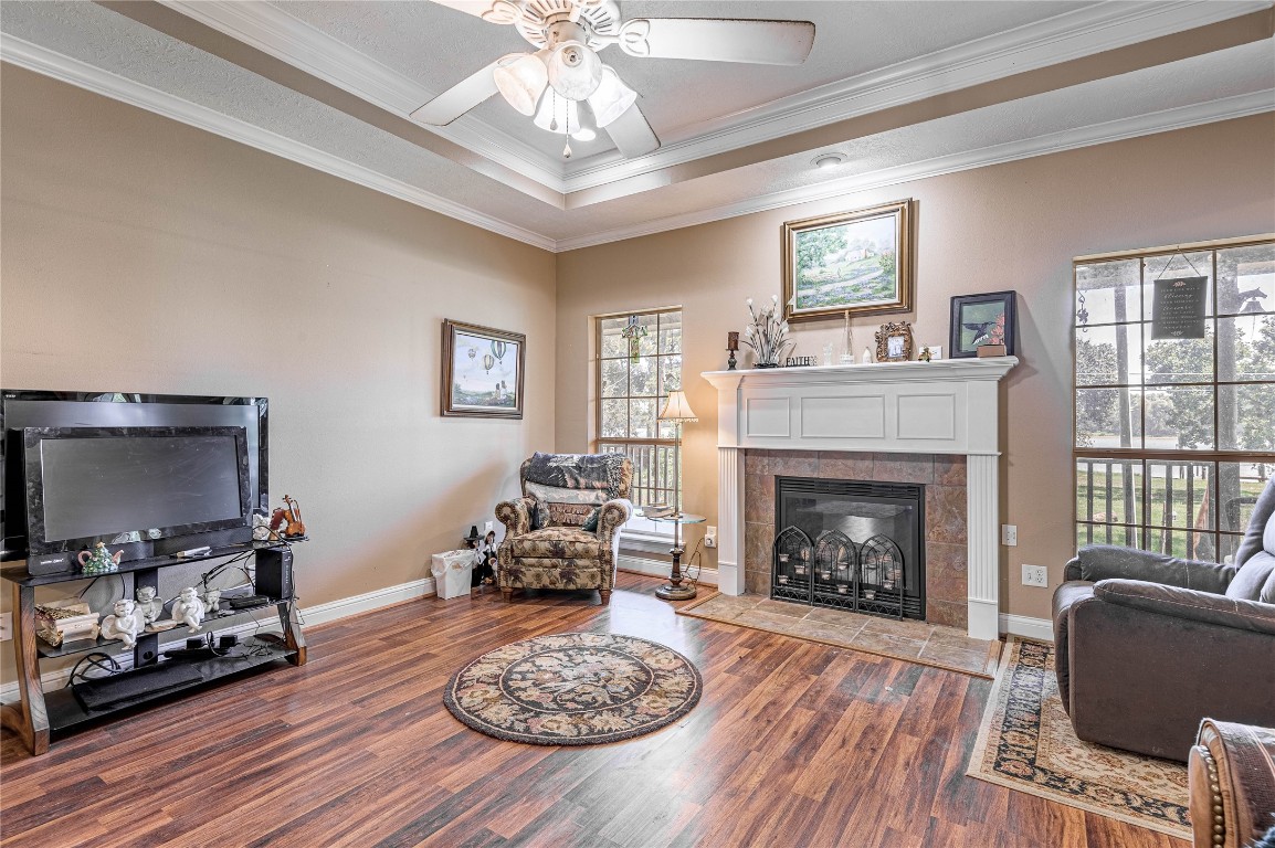 206 Lake Front Drive Trinity, TX 75862 - Photo 18 of 48 a living room with furniture fireplace and flat screen tv