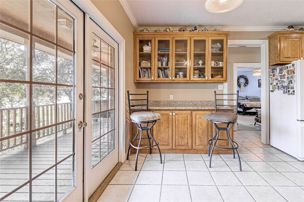 206 Lake Front Drive Trinity, TX 75862 - Photo 20 of 48 a dining room with furniture and large window
