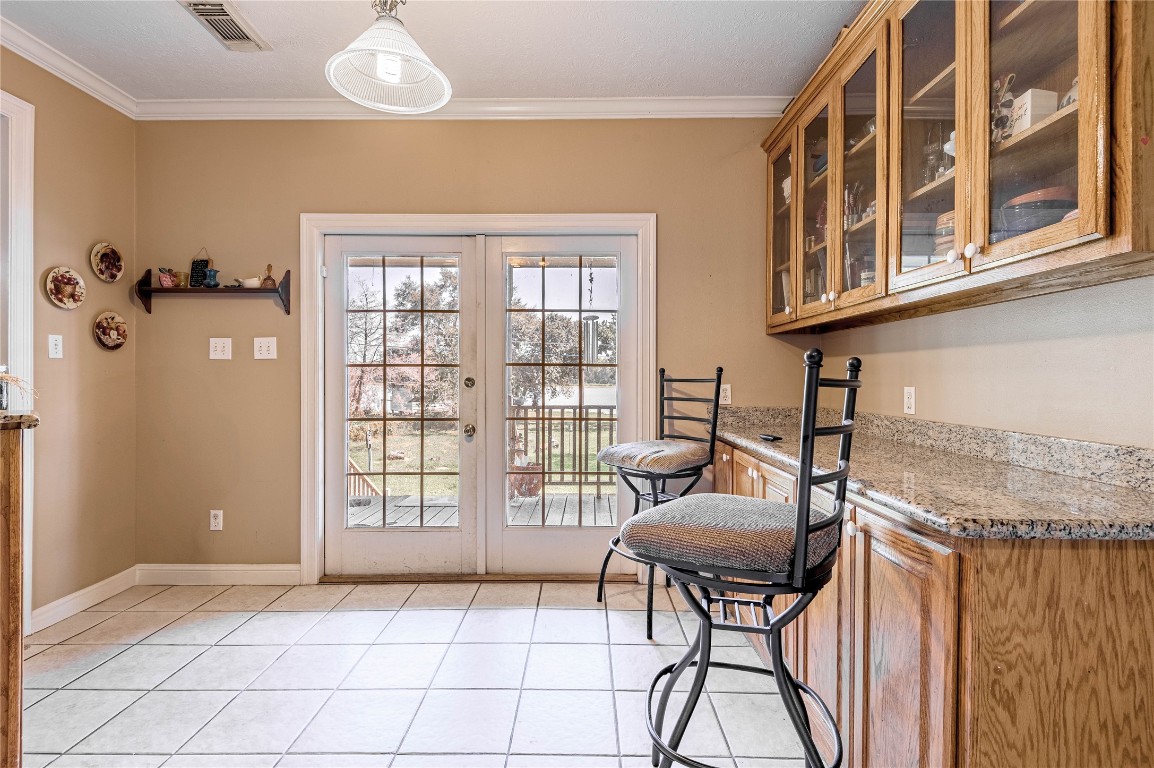 206 Lake Front Drive Trinity, TX 75862 - Photo 21 of 48 a bedroom with furniture and a window