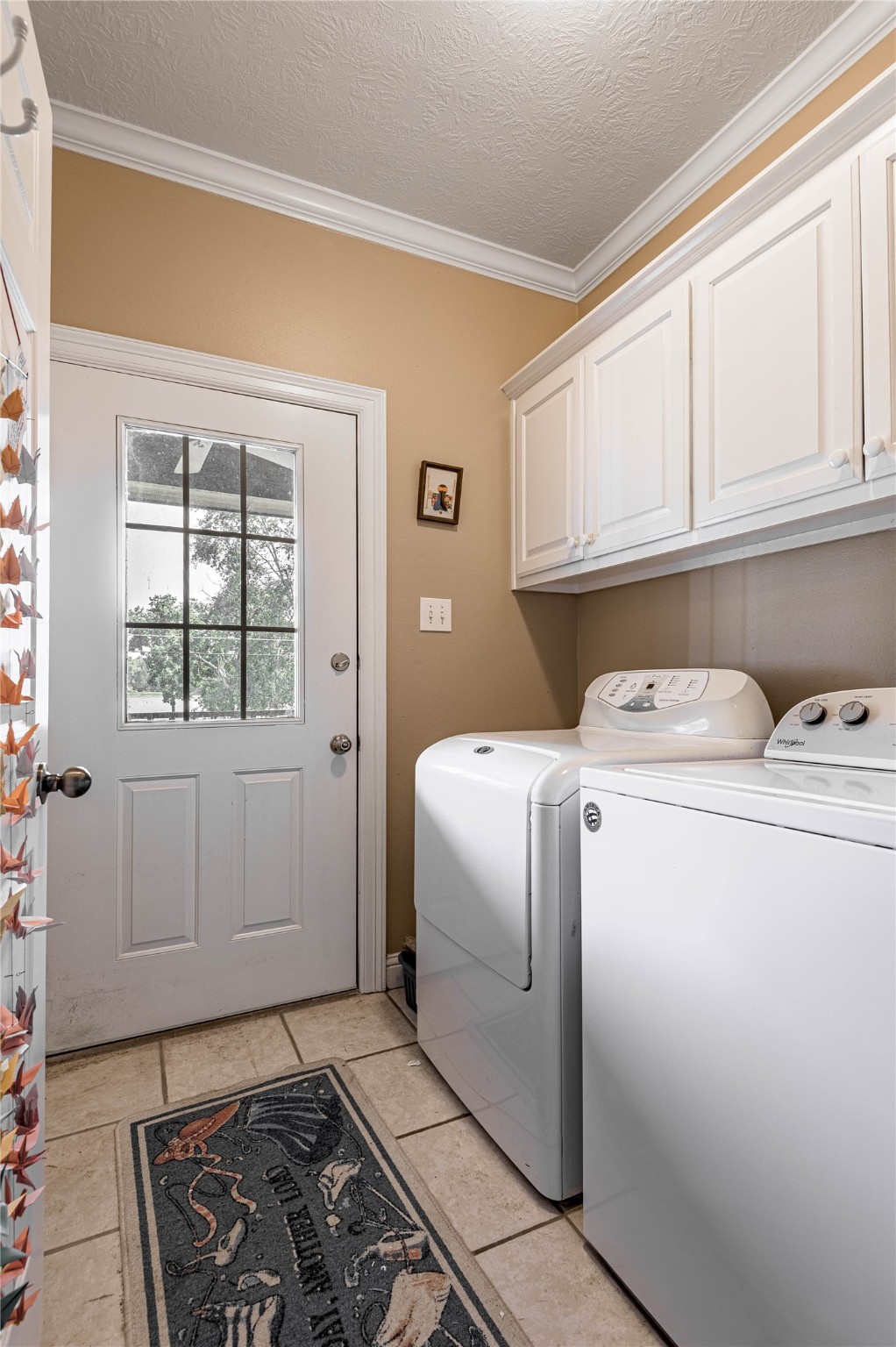 206 Lake Front Drive Trinity, TX 75862 - Photo 28 of 45 a utility room with dryer and washer