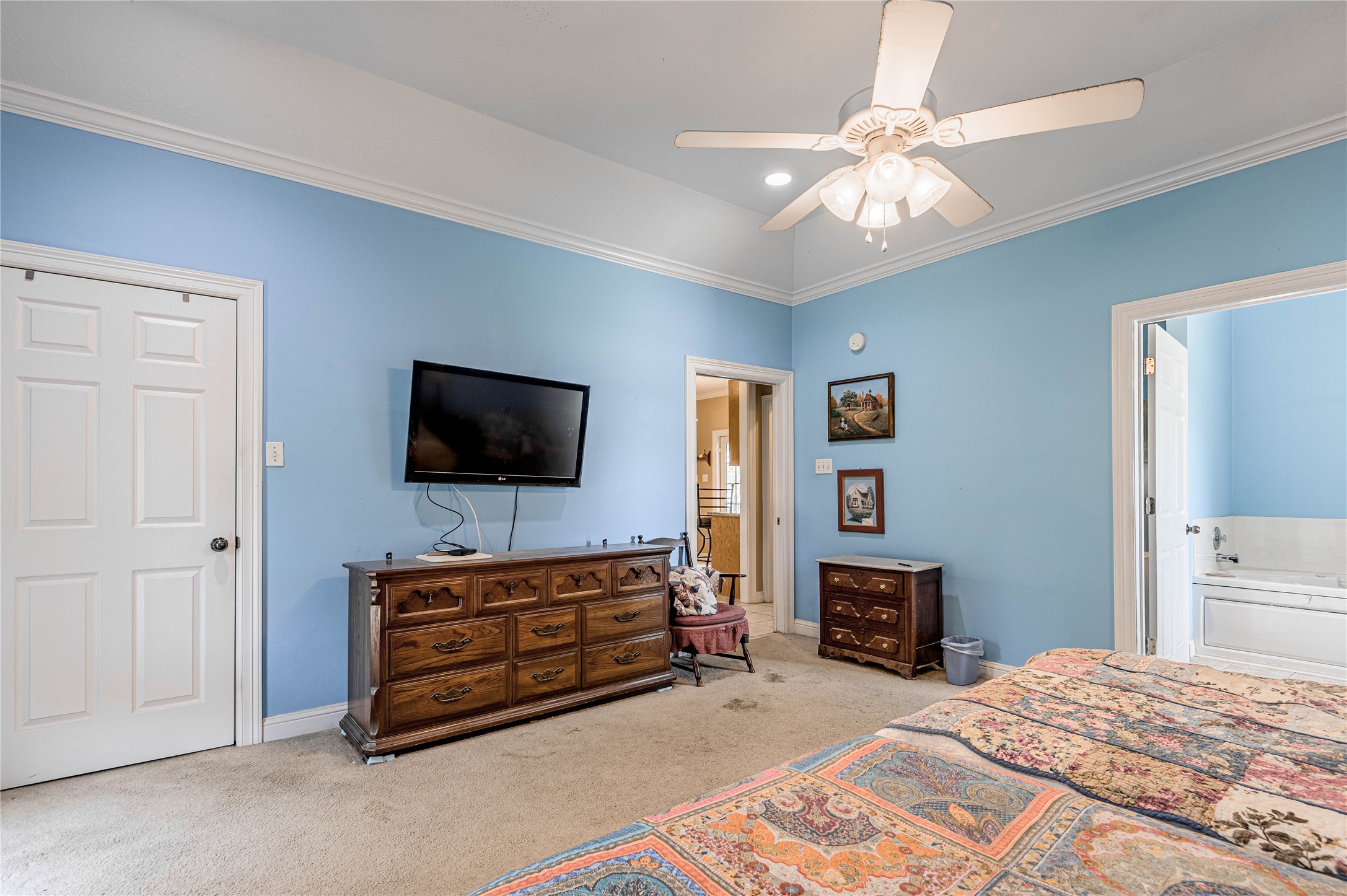 206 Lake Front Drive Trinity, TX 75862 - Photo 34 of 48 a bedroom with furniture and a flat screen tv