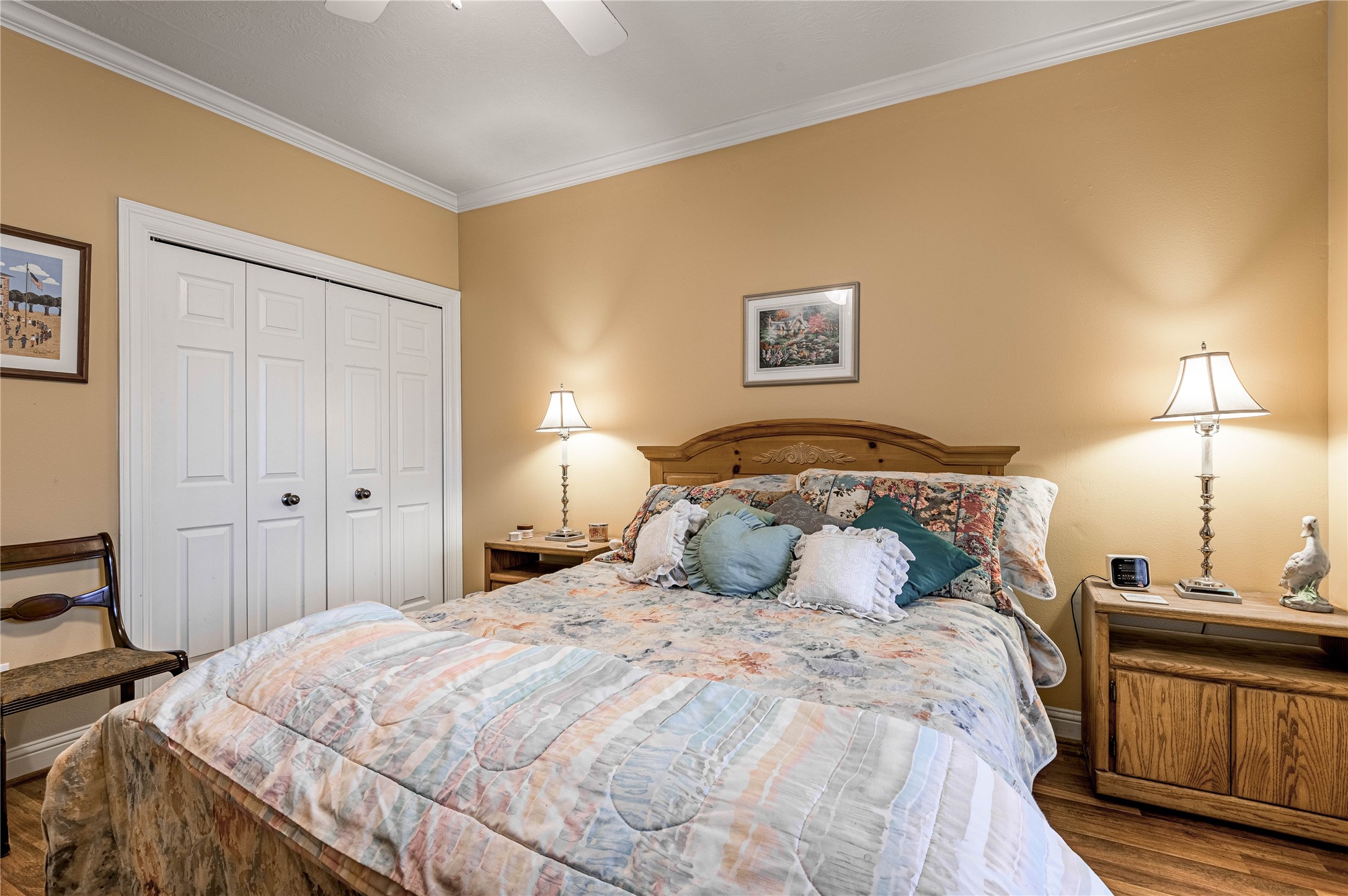 206 Lake Front Drive Trinity, TX 75862 - Photo 40 of 48 a bedroom with a bed and wooden floor