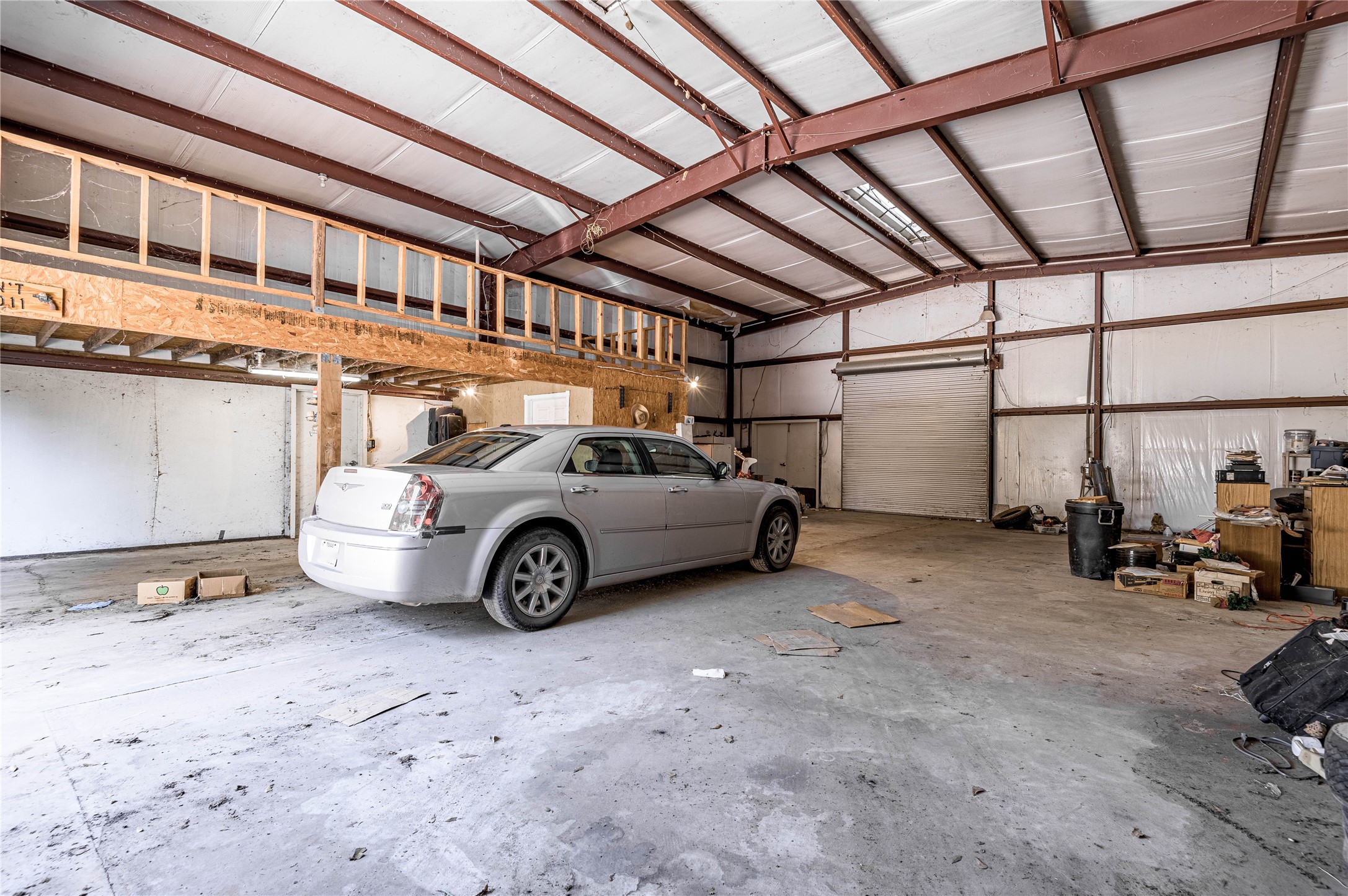 206 Lake Front Drive Trinity, TX 75862 - Photo 44 of 45 a view of a car in garage