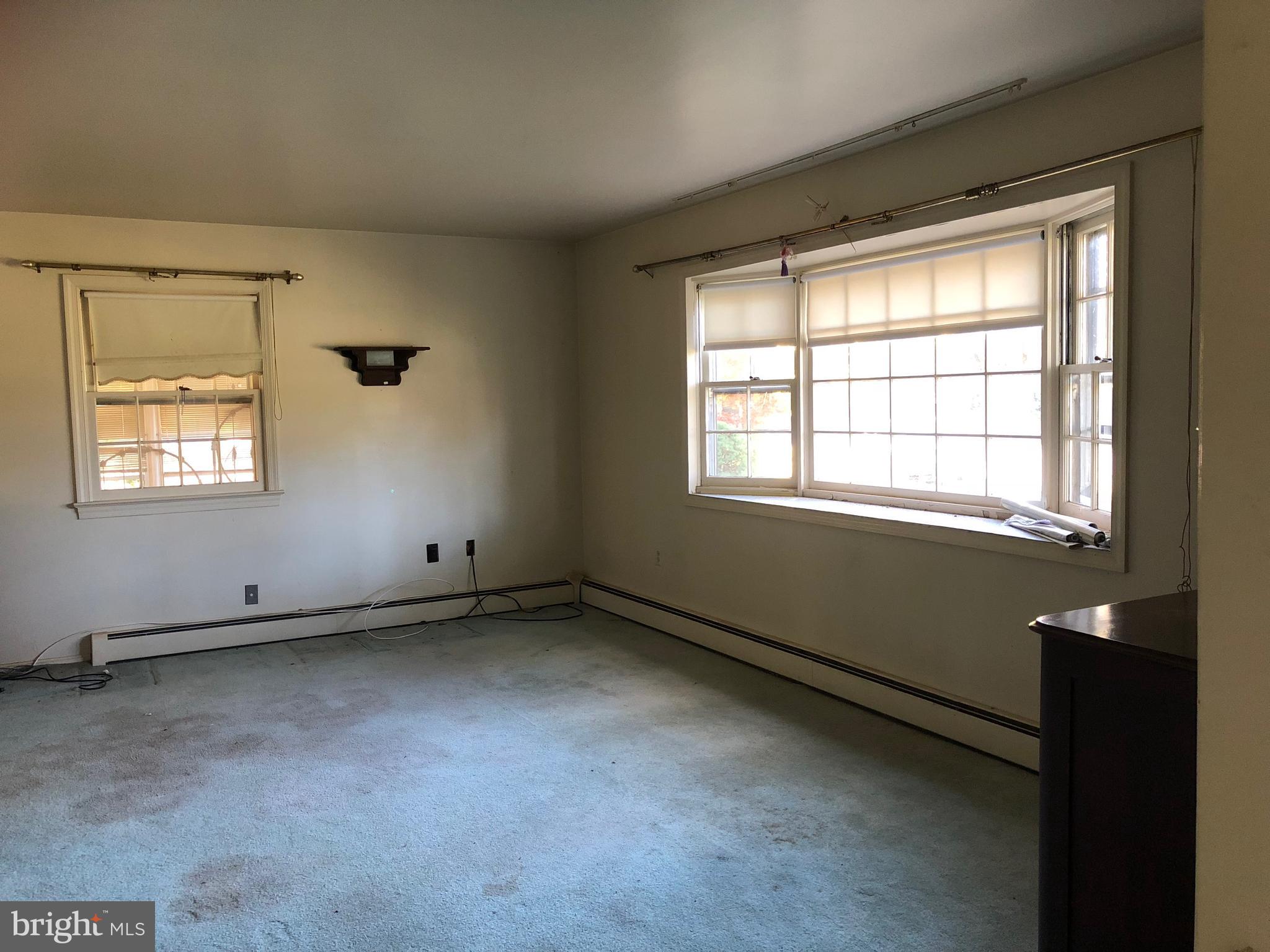 16031 Riffle Ford Road Gaithersburg, MD 20878 - Photo 2 of 23 an empty room with a window