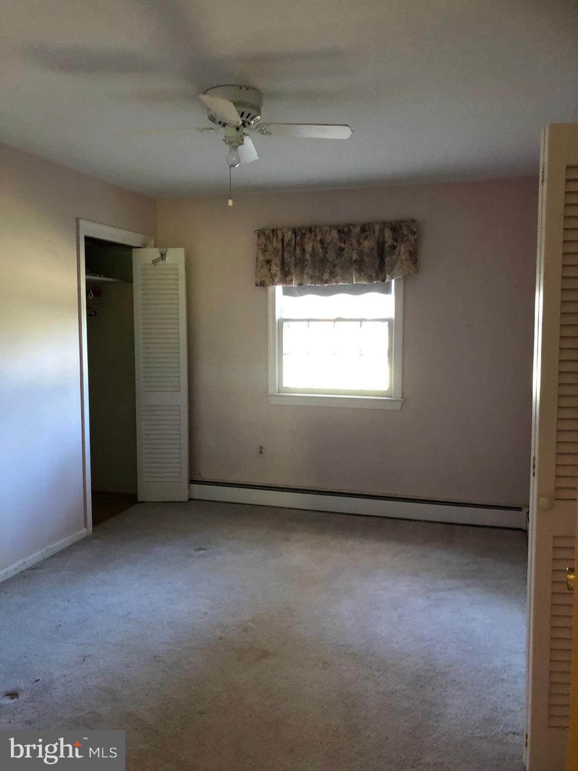 16031 Riffle Ford Road Gaithersburg, MD 20878 - Photo 11 of 23 an empty room with a window