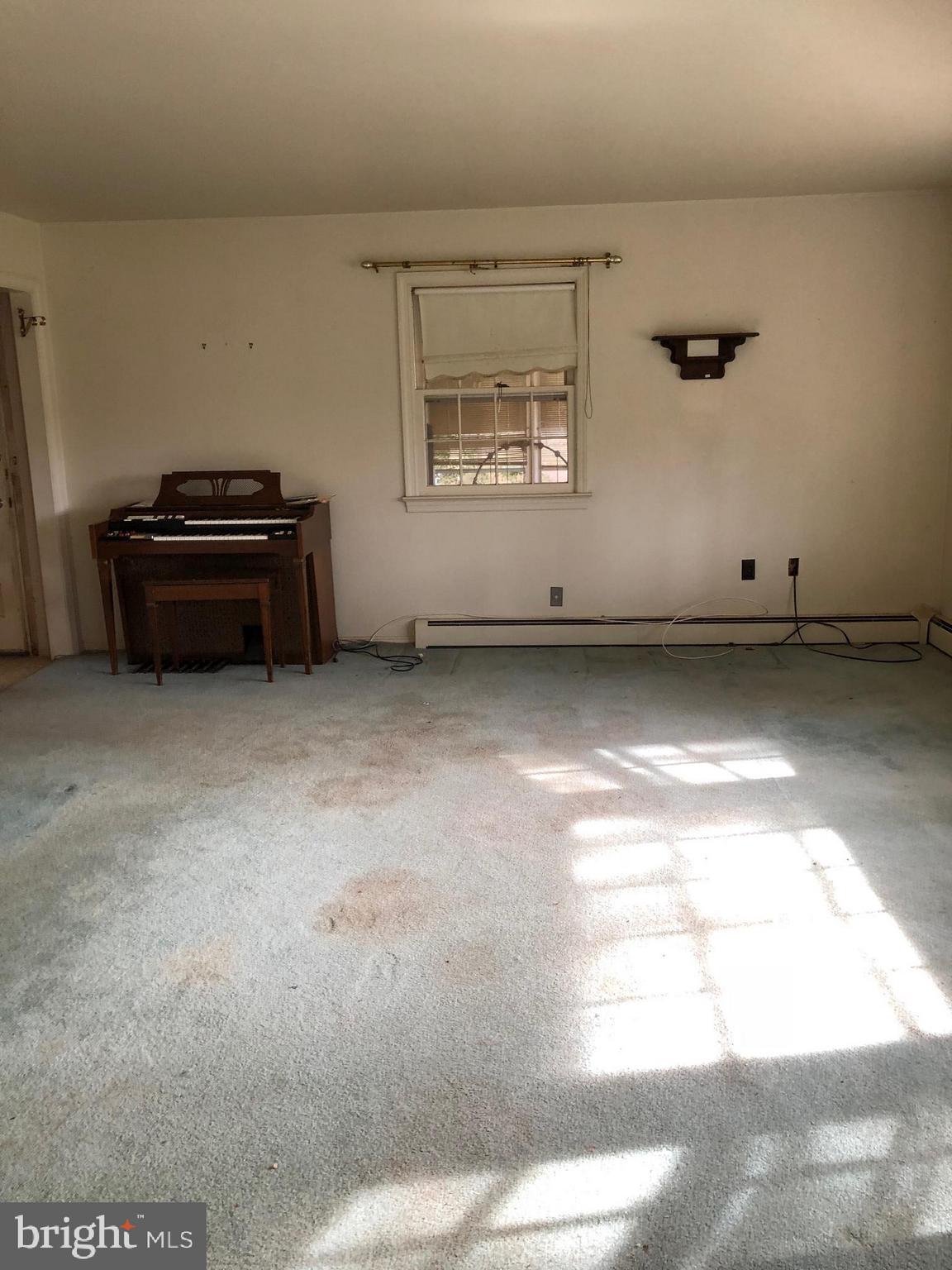 16031 Riffle Ford Road Gaithersburg, MD 20878 - Photo 3 of 23 a view of a room with window