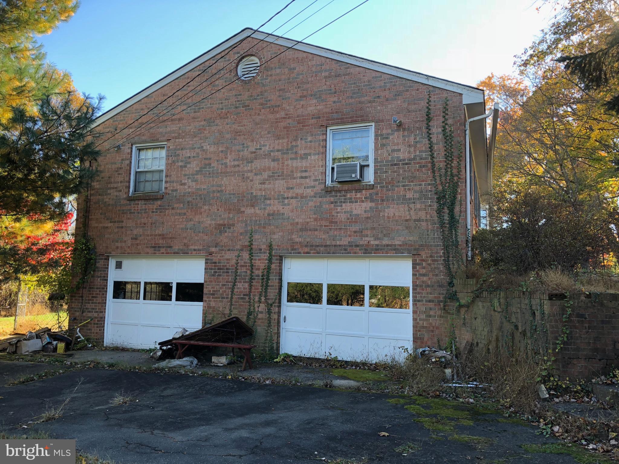 16031 Riffle Ford Road Gaithersburg, MD 20878 - Photo 23 of 23 a front view of a house with a yard