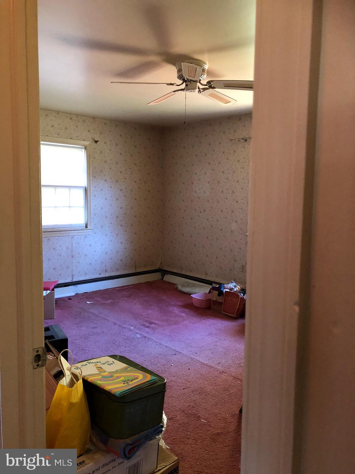 16031 Riffle Ford Road Gaithersburg, MD 20878 - Photo 6 of 23 a view of a small space with wooden floor