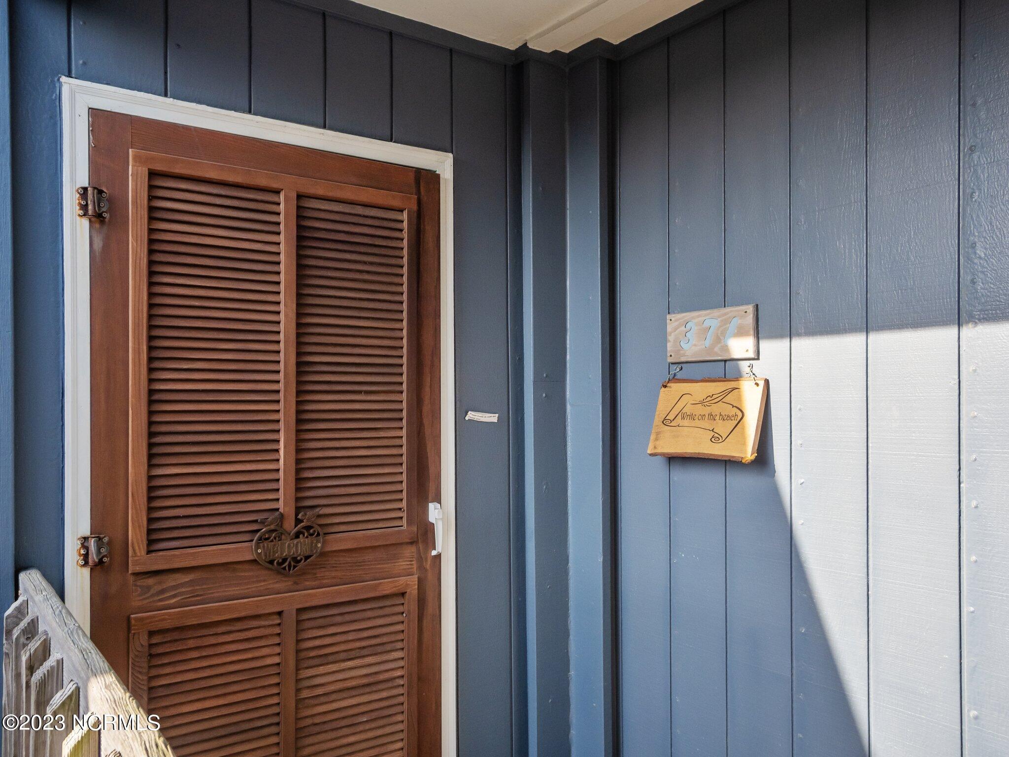 2182 New River Inlet Road, Unit 371 North Topsail Beach, NC 28460 - Photo 27 of 40 Front Door