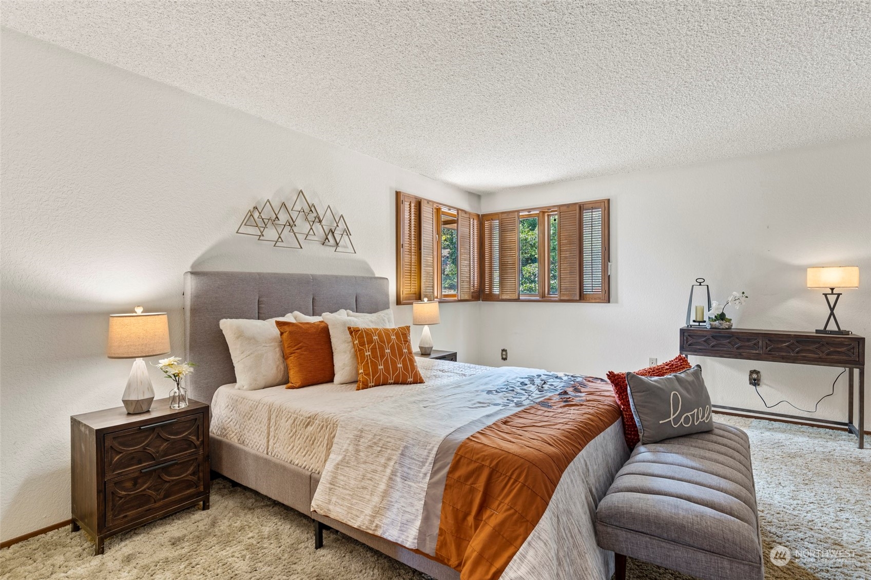 411 Seneca Court Northwest Renton, WA 98057 - Photo 15 of 37 a bedroom with a bed and lamp