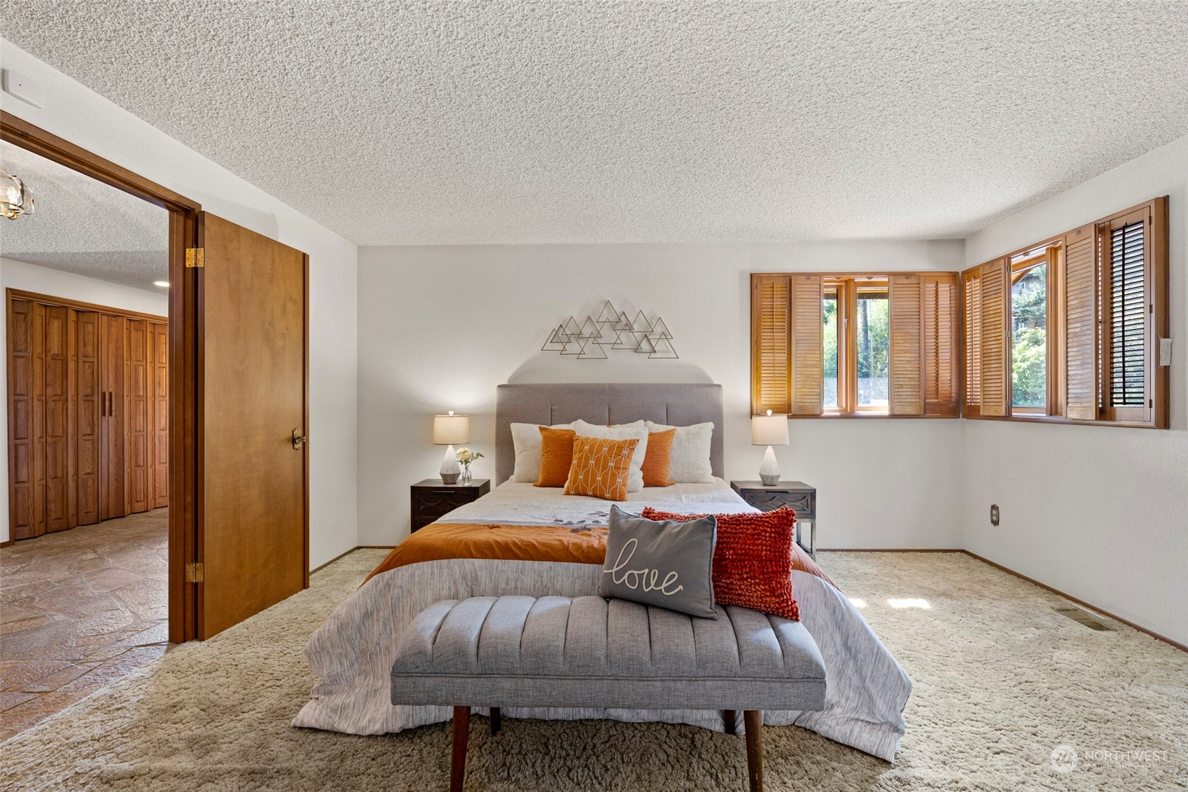 411 Seneca Court Northwest Renton, WA 98057 - Photo 16 of 37 a bedroom with a bed and window