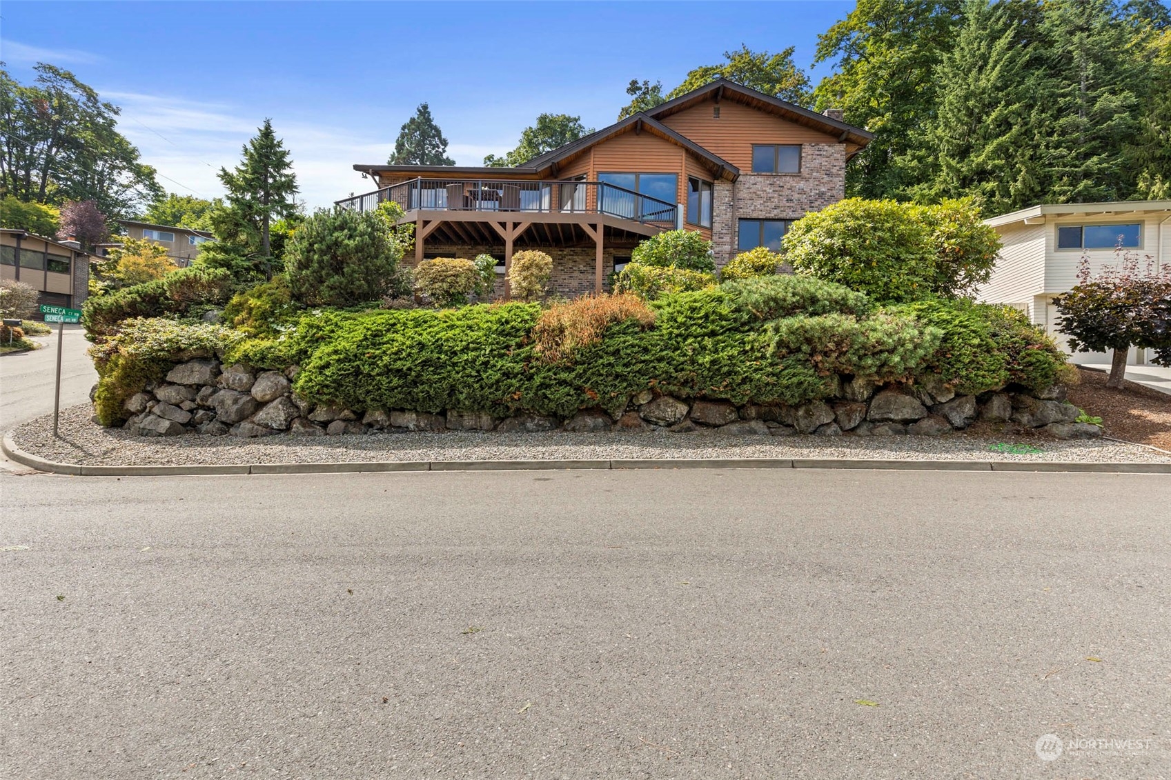 411 Seneca Court Northwest Renton, WA 98057 - Photo 2 of 37 front view of a house with a street