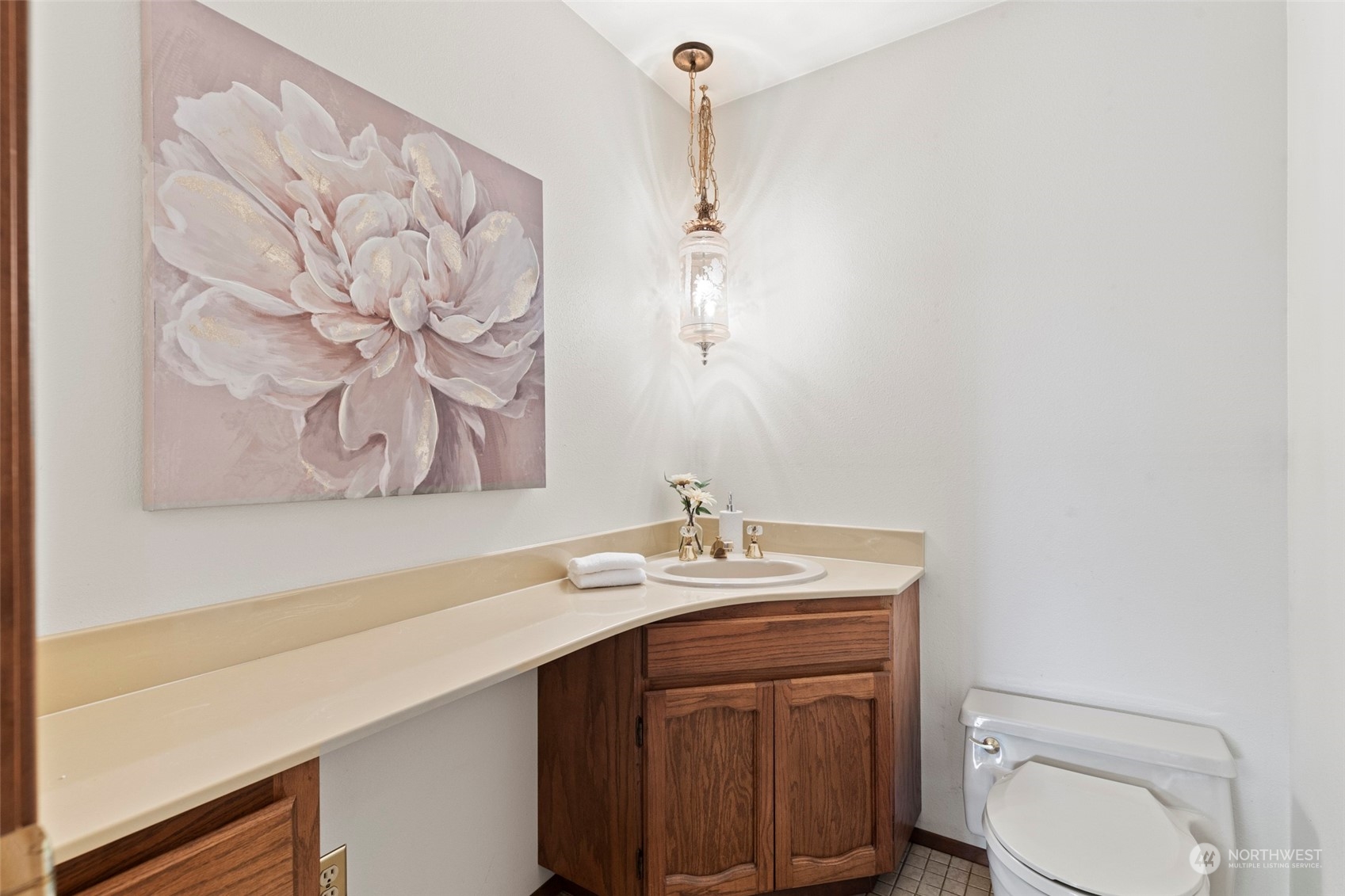 411 Seneca Court Northwest Renton, WA 98057 - Photo 24 of 37 a bathroom with a sink a toilet and mirror