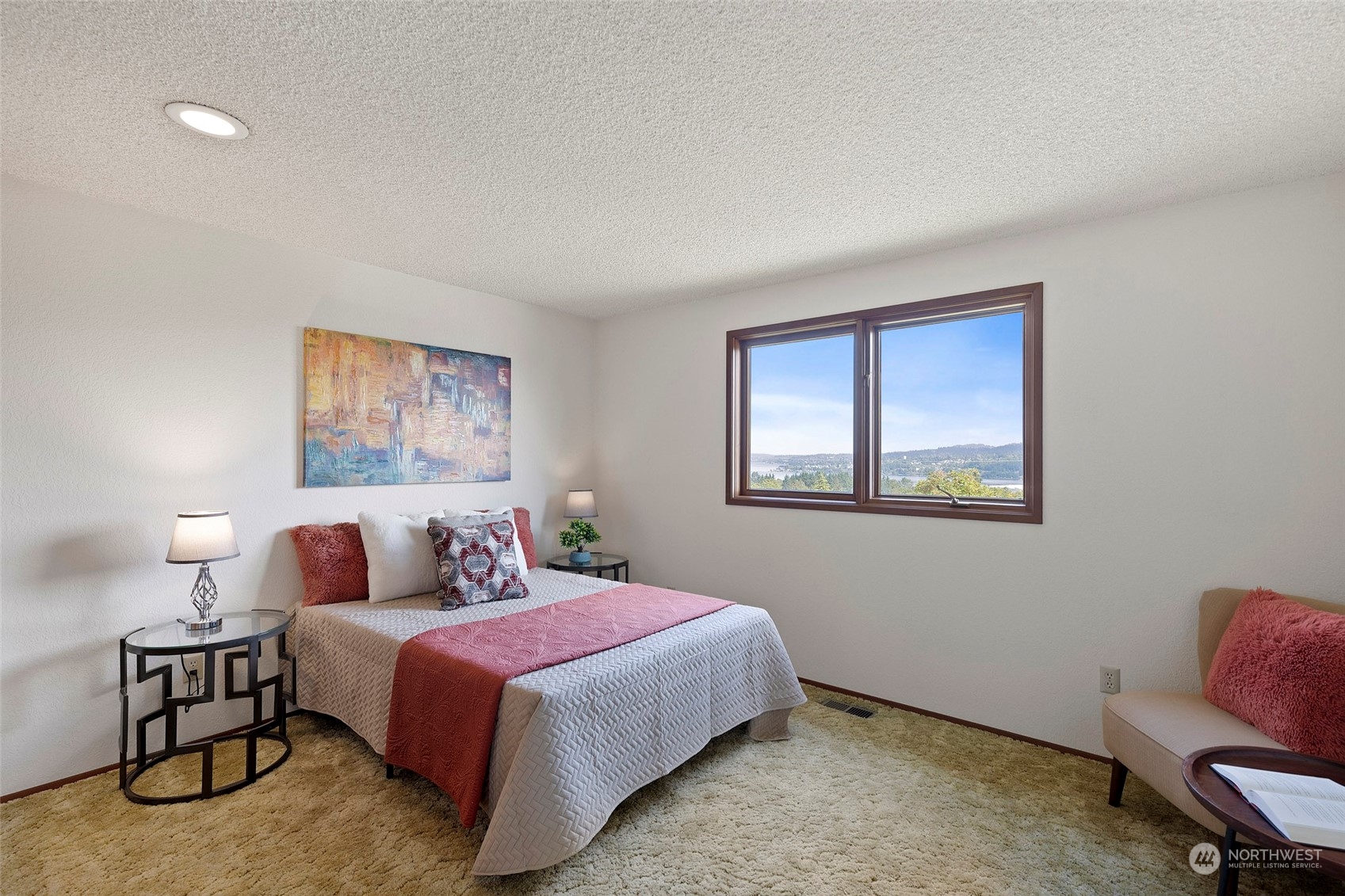 411 Seneca Court Northwest Renton, WA 98057 - Photo 30 of 37 a bedroom with a bed and a lamp