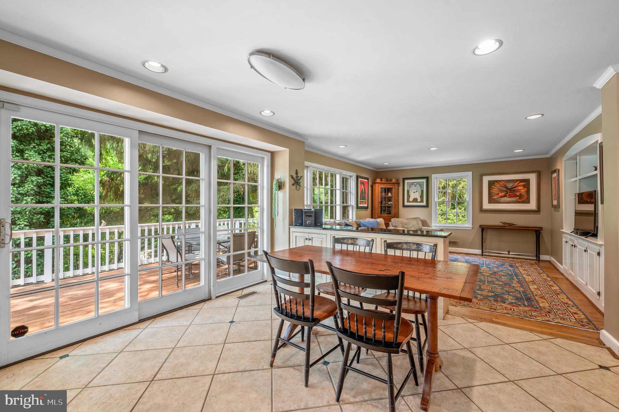 211 Spruce Tree Road Wayne, PA 19087 - Photo 12 of 44 a dining room with furniture and large windows