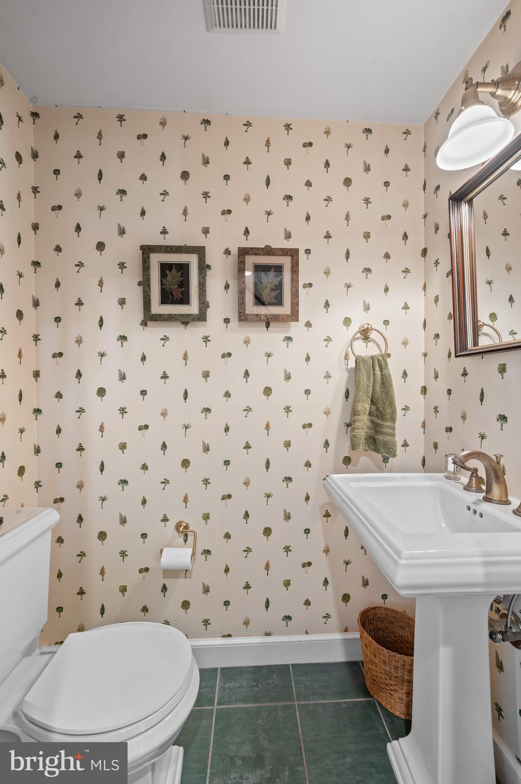211 Spruce Tree Road Wayne, PA 19087 - Photo 20 of 44 a bathroom with a sink toilet and a mirror
