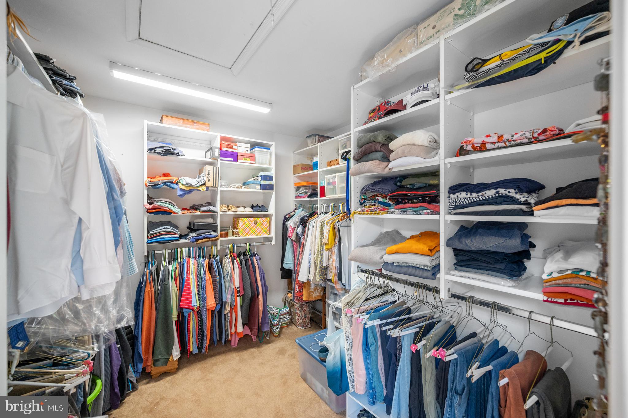 211 Spruce Tree Road Wayne, PA 19087 - Photo 24 of 44 a view of walk in closet with clothes and shoes