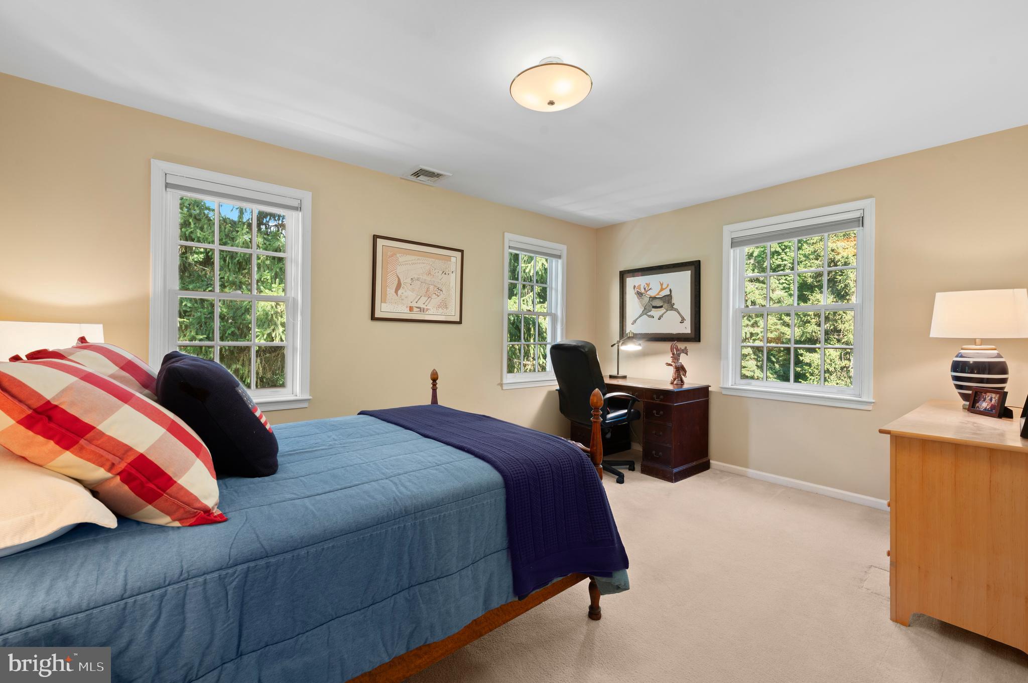 211 Spruce Tree Road Wayne, PA 19087 - Photo 28 of 44 a bedroom with a bed and a windows