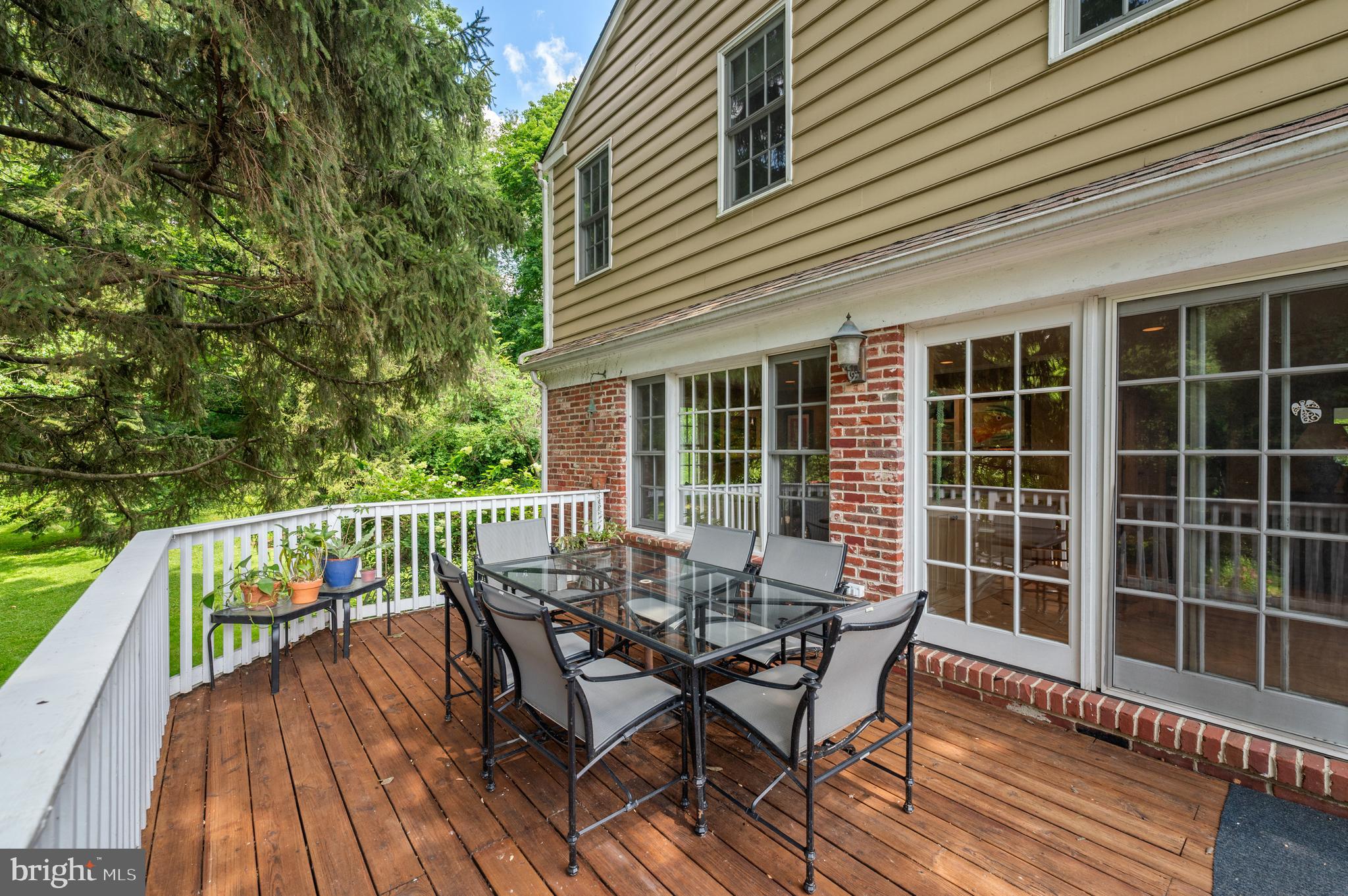 211 Spruce Tree Road Wayne, PA 19087 - Photo 31 of 44 a view of a deck with furniture and wooden floor