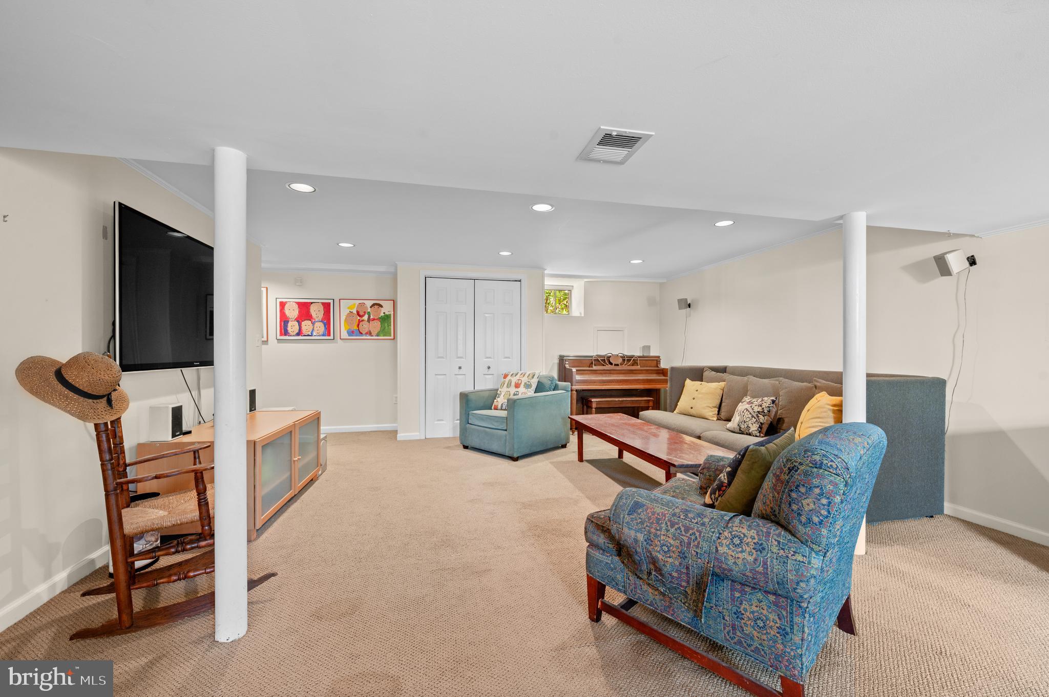 211 Spruce Tree Road Wayne, PA 19087 - Photo 36 of 44 a living room with furniture and a flat screen tv