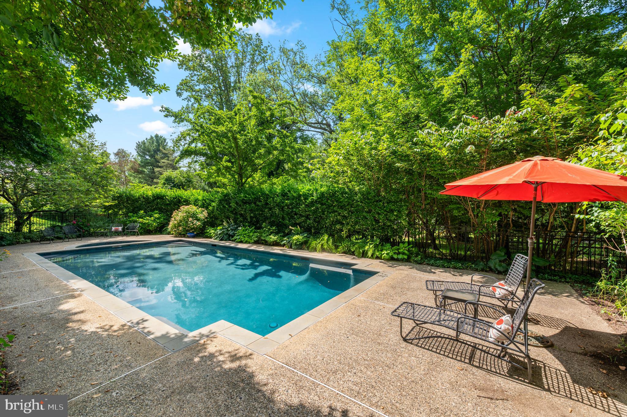 211 Spruce Tree Road Wayne, PA 19087 - Photo 39 of 44 a view of a swimming pool with a patio