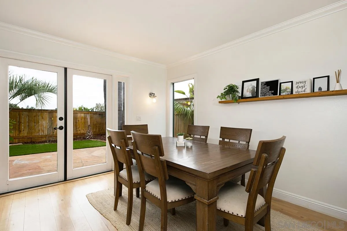 1265 Longfellow Road Vista, CA 92081 - Photo 13 of 28 a view of a dining room with furniture window and wooden floor