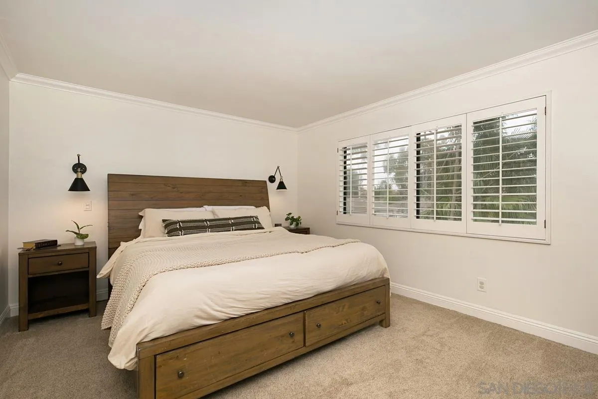 1265 Longfellow Road Vista, CA 92081 - Photo 17 of 28 a bedroom with a bed and a window