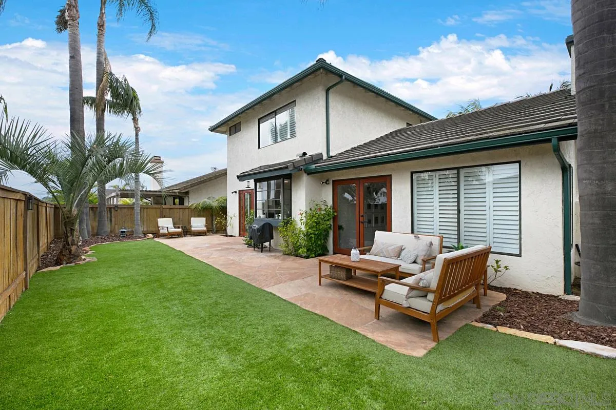 1265 Longfellow Road Vista, CA 92081 - Photo 28 of 28 a view of a house with backyard sitting area and garden