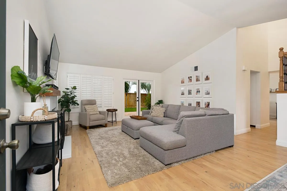 1265 Longfellow Road Vista, CA 92081 - Photo 6 of 28 a living room with furniture and a couch