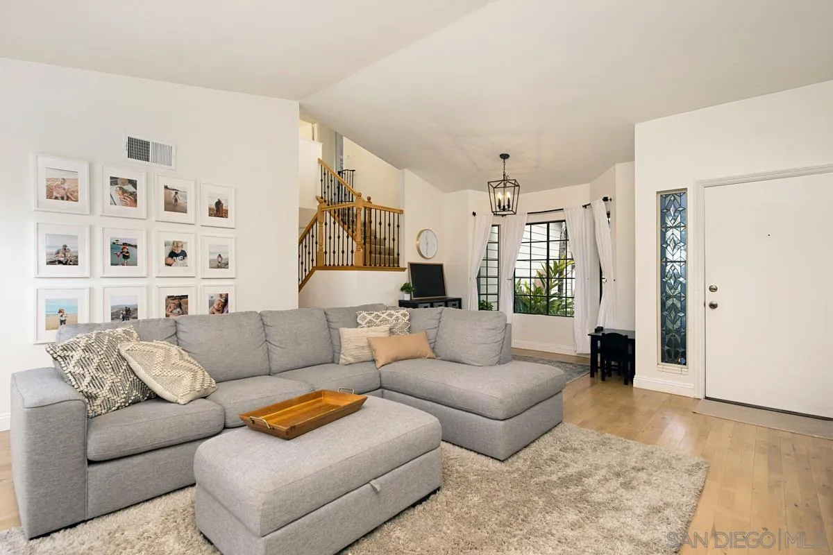 1265 Longfellow Road Vista, CA 92081 - Photo 8 of 28 a living room with furniture and a rug