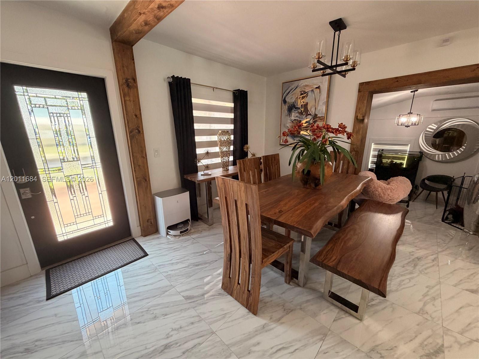 315 West 62nd Street Hialeah, FL 33012 - Photo 14 of 21 a dining room with furniture and window