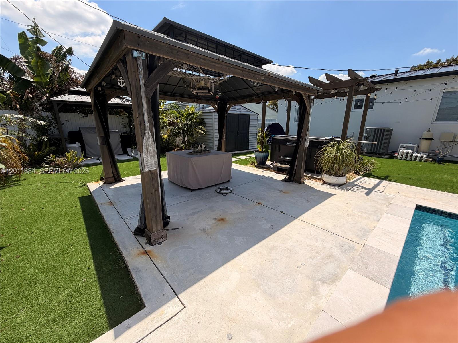 315 West 62nd Street Hialeah, FL 33012 - Photo 3 of 21 a view of outdoor space yard and porch