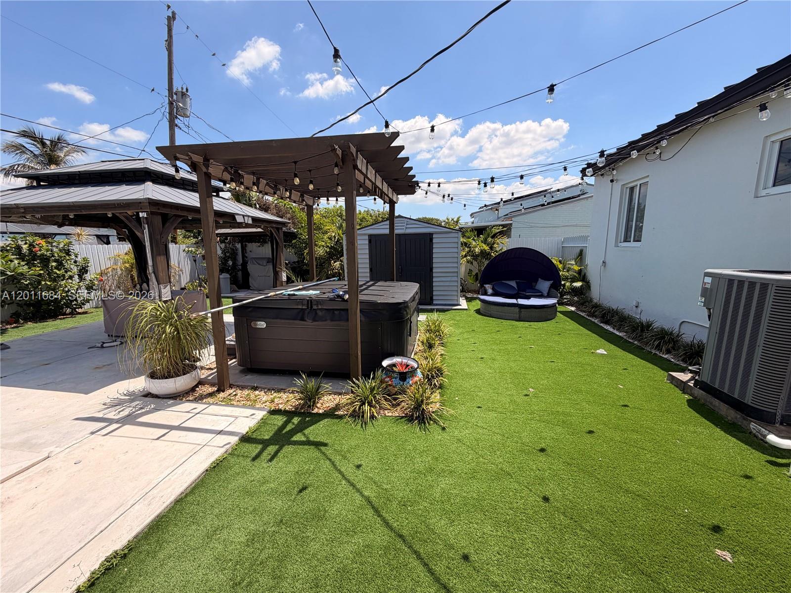 315 West 62nd Street Hialeah, FL 33012 - Photo 8 of 21 a view of a chairs and table in patio