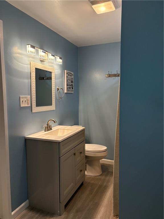 2283 Sandy Plains Road Clarksville, PA 15322 - Photo 13 of 18 a bathroom with a toilet sink and mirror
