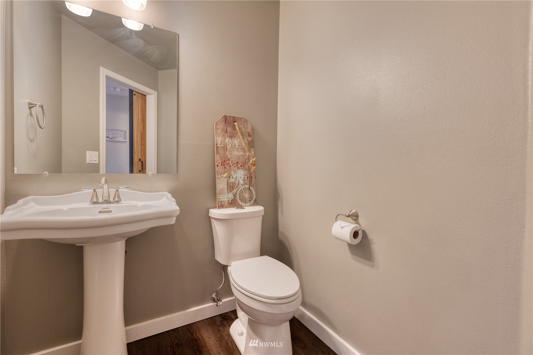 7414 Vandermark Road East Bonney Lake, WA 98391 - Photo 15 of 40 a bathroom with a sink a toilet and mirror