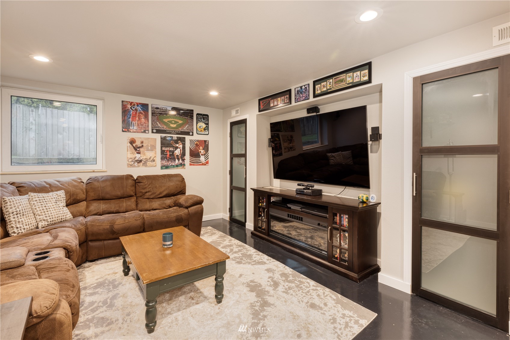 7414 Vandermark Road East Bonney Lake, WA 98391 - Photo 18 of 40 a living room with furniture and a flat screen tv