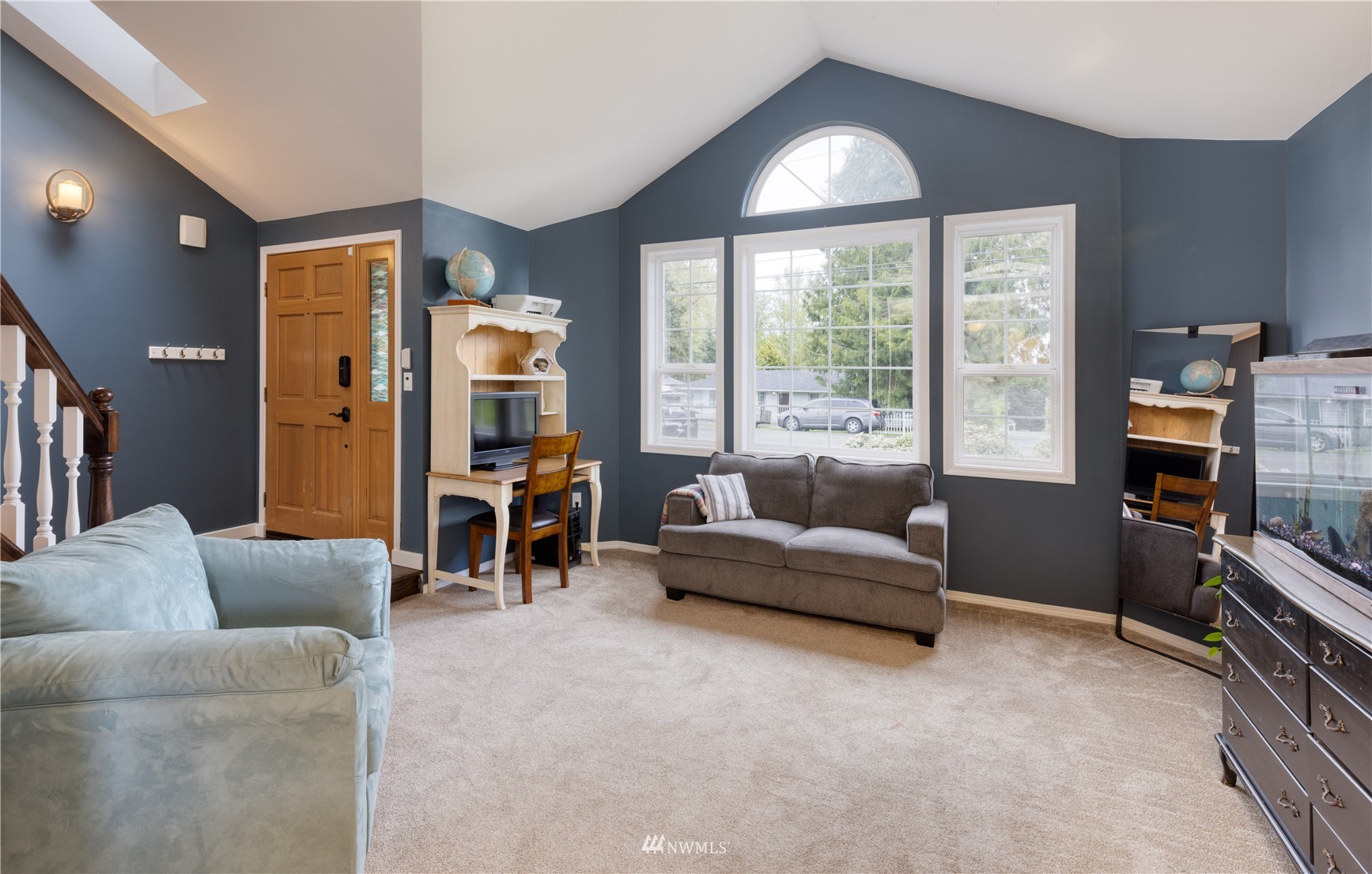 7414 Vandermark Road East Bonney Lake, WA 98391 - Photo 2 of 40 a living room with furniture and a flat screen tv