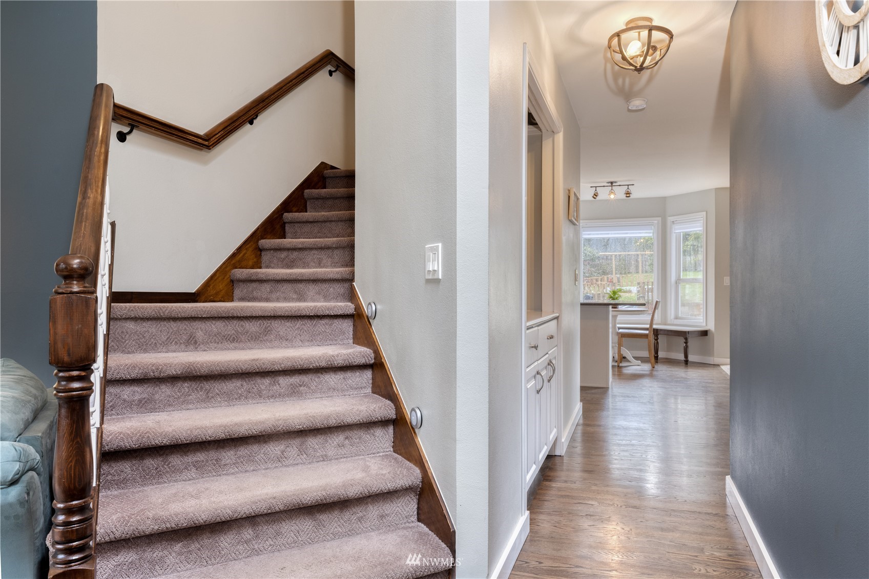 7414 Vandermark Road East Bonney Lake, WA 98391 - Photo 23 of 40 a view of an entryway with wooden floor and a livingroom view