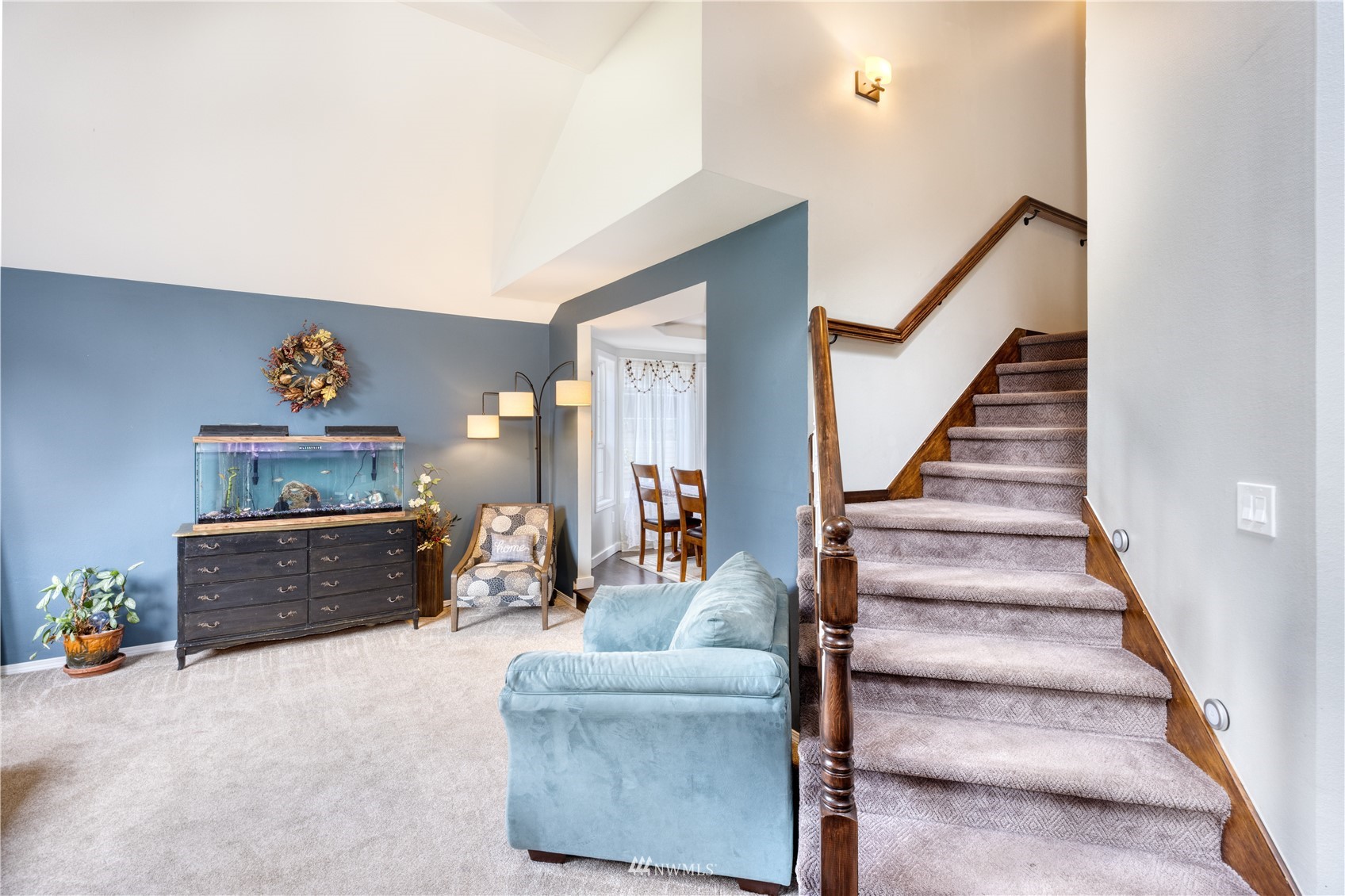 7414 Vandermark Road East Bonney Lake, WA 98391 - Photo 3 of 40 a livingroom with furniture and stairs