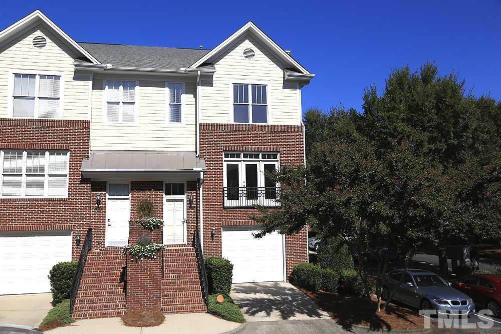 6111 Shandwick Court Raleigh, NC 27609 - Photo 1 of 17 a front view of a house with a yard