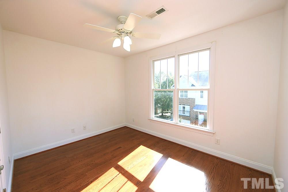 6111 Shandwick Court Raleigh, NC 27609 - Photo 12 of 17 an empty room with a window