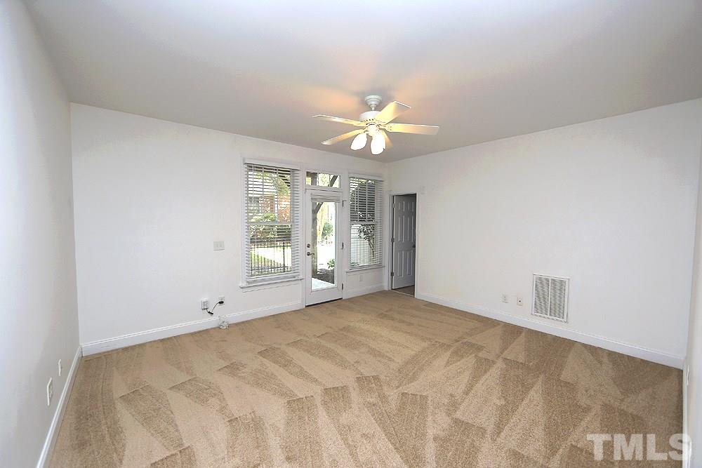 6111 Shandwick Court Raleigh, NC 27609 - Photo 15 of 17 a view of an empty room with a window