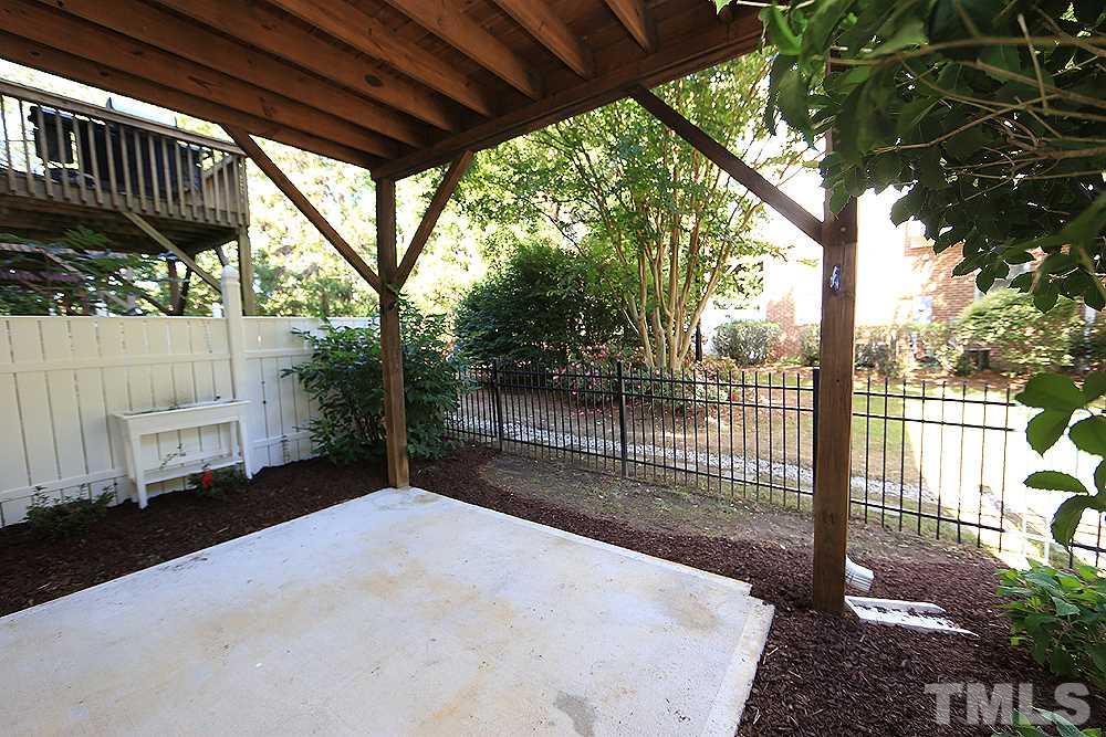 6111 Shandwick Court Raleigh, NC 27609 - Photo 16 of 17 a view of backyard with green space