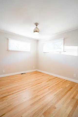 a view of cabinets and wooden floor