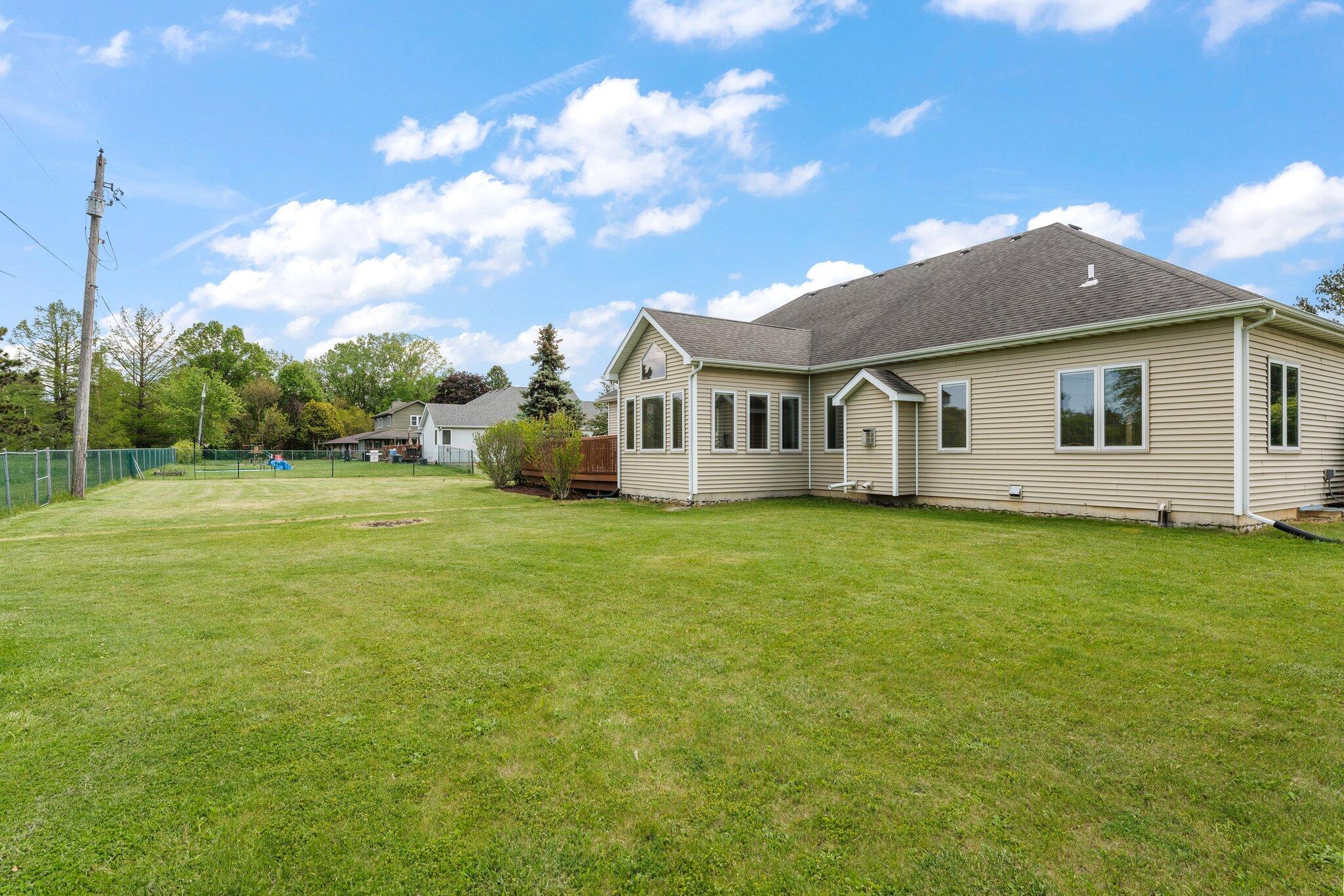 256 Pineview Lane Valparaiso, IN 46383 - Photo 16 of 18 a view of a house with a backyard