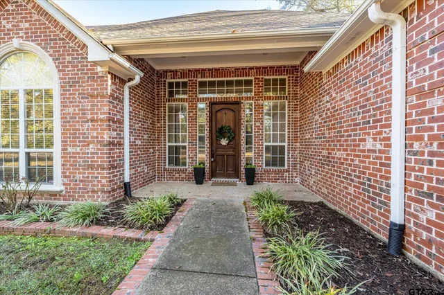 a front view of a house with a porch