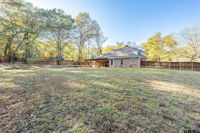 front view of a house with a big yard
