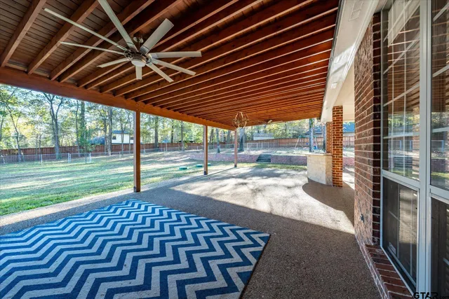 a view of backyard with wooden floor