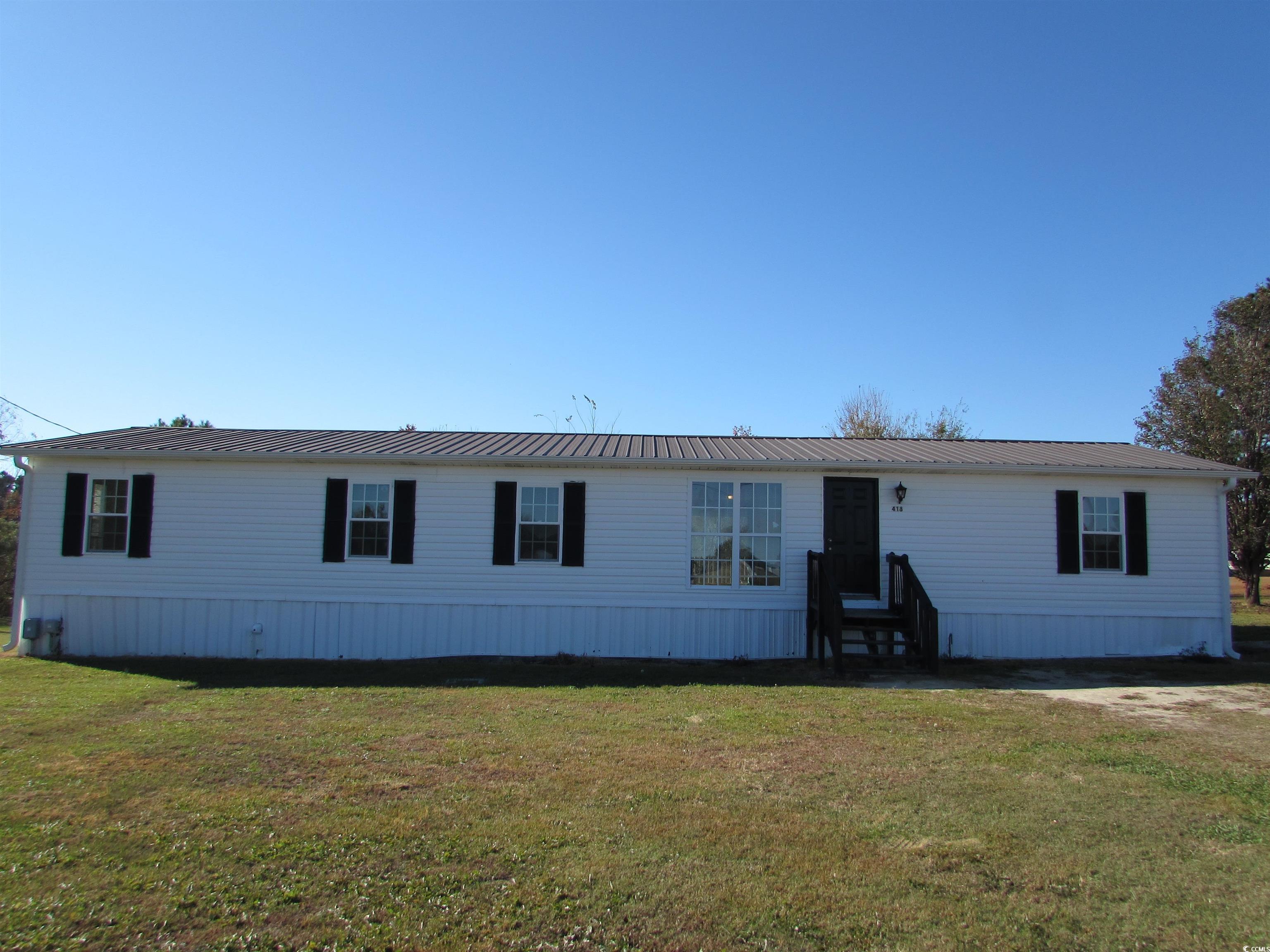 418 Twilight Road Galivants Ferry, SC 29544 - Photo 1 of 40 Manufactured home featuring a front yard and metal