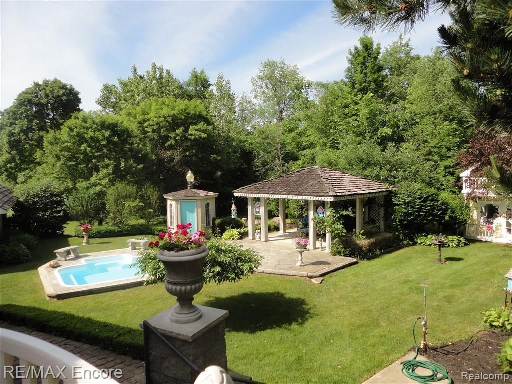 6435 Lahring Road Holly, MI 48442 - Photo 47 of 53 Pool area view from porch.jpg